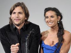 PHOTO: Ashton Kutcher and Demi Moore speak at the 13th annual Costume Designers Guild Awards in Beverly Hills, Calif., Feb. 22, 2011.