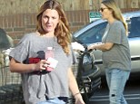 Time to get cooking! Drew Barrymore shows off her bump as she loads up ahead of the Thanksgiving feasting