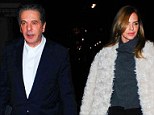 Close: Charles Saatchi with his dinner date Trinny Woodall on Monday, who today wrote that cocaine and alcohol turned her into a 'fake, lying, thieving, cheating person'