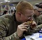 U.S. troops eat during a Thanksgiving meal at a NATO base in Kabul 