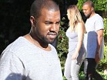 Have Mercy! Kanye West can't take his eyes off fiance Kim Kardashian's famous curves as they're joined by pals ahead of Miami Thanksgiving feast