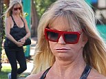Bah humbug! Goldie Hawn dons quite the scowl after Thanksgiving trip to the gym before heading to son Oliver Hudson's house for the holidays