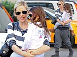 Like mother, like daughter: Sarah Michelle Gellar and her little girl Charlotte matching in tracksuit bottoms and Ugg boots for a stop at Starbucks in Los Angeles, California on Thursday