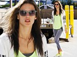 Shine like the sun: Alessandra Ambrosio donned neon yellow pieces to pamper herself at a nail salon in Brentwood, California on Saturday