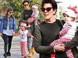 'Tis the season! Kourtney Kardashian, left, dressed her kids Mason and Penelope in elf costumes to see a movie with her mother Kris Jenner, right, and Bruce Jenner (not pictured) to a movie in Calabasas, California on Friday