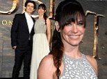 Gilded Lilly! Evangeline weaves her magic spell at The Hobbit: The Desolation Of Smaug premiere as she cuddles up to Orlando Bloom