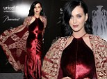 Katy Perry is regal in red velvet gown and embellished cape at UNICEF Snowflake Ball after being named Goodwill Ambassador