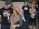 The honeymoon is over... for now! Kaley Cuoco and fiance Ryan Sweeting return home from romantic trip to the Bahamas and still continue to pack on the PDA 