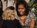 Damage control: Mrs Obama looked more concerned about the run-in than Ashtyn herself