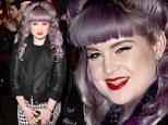 Check her out! Kelly Osbourne strides into the Beyonce afterparty in patterned pants while sporting a gargantuan purple bouffant 