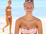 She's a natural! Make-up free Erin Heatherton flaunts flawless figure in pink bikini as she takes ocean dip in Barbados