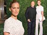 Lovely in lace: Bar Refaeli pulls off an outfit unbecoming on most as she adds some flare to designer Michael Kors' Milan boutique opening