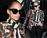 That's how to mix prints! Nicole Richie stylishly combines a striped shirt and floral bomber to take off from Los Angeles International Airport on Wednesday
