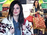 Thrifty fashionista! Stylish Rachel Bilson snaps up a bag full of cut price clothes from discount department store T.J. Maxx 