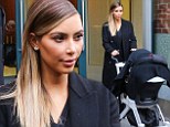Kim Kardashian steps out with daughter North in New York just days after rubbishing reports she doesn't spend enough time with her baby