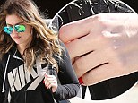 Is the ring off for good? It's been 12 days since Khloe Kardashian stepped out with her wedding rock from Lamar Odom