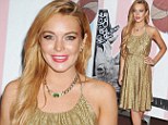 Loud and proud: Lindsay Lohan made a bold statement by arriving in a glittering gold dress to the Art Basel: Art of Bullfighting event in Miami, Florida on Thursday