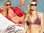 Another day, another pair of sexy bikinis for Jessica Hart as she is back on the beach