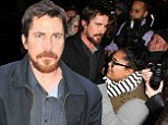The perfect swarm! Christian Bale mobbed by fans as he steps out in New York to promote American Hustle