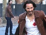 There will be blood: New pictures of Keanu Reeves on the set of John Wick shows the actor battered, bruised and covered in gore