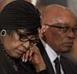Nelson Mandela's former wife Winnie Madikizela-Mandela (left), and South African President Jacob Zuma attend a memorial service for Mandela