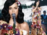 Blooming lovely! Katy Perry covers herself in flowers to protect her modesty in a sheer dress on Italian X Factor