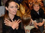 Angelina Jolie's little prince Knox smiles with delight as family join The Lion King cast and crew after Sydney show