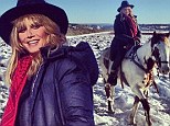 Trotting in a winter wonderland! Heidi Klum looks beautiful as she goes on a horse ride in the Utah snow after taking road trip