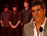 Clearly disappointed: Simon Cowell looked glum on Thursday as his country music boy band Restless Road was eliminated from The X Factor