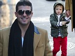 I need a Thicke-r coat daddy! Robin¿s son Julian feels the chill as they go walkabout in New York