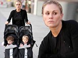 Who needs a nanny? Anna Paquin has double duty as she pushes 15-month-old twins Charlie and Poppy in their pram