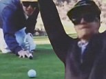'Justin Bieber... putting for eagle': Pop heartthrob spices up round of golf by using his club as a pool cue