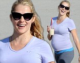 Beaming! Teresa Palmer glowed as she proudly showed off her growing belly while leaving Equinox gym in Los Angeles, California on Friday