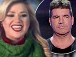 American Idol vets face off: Kelly Clarkson's holiday special gets more viewers than former mentor Simon Cowell's X Factor