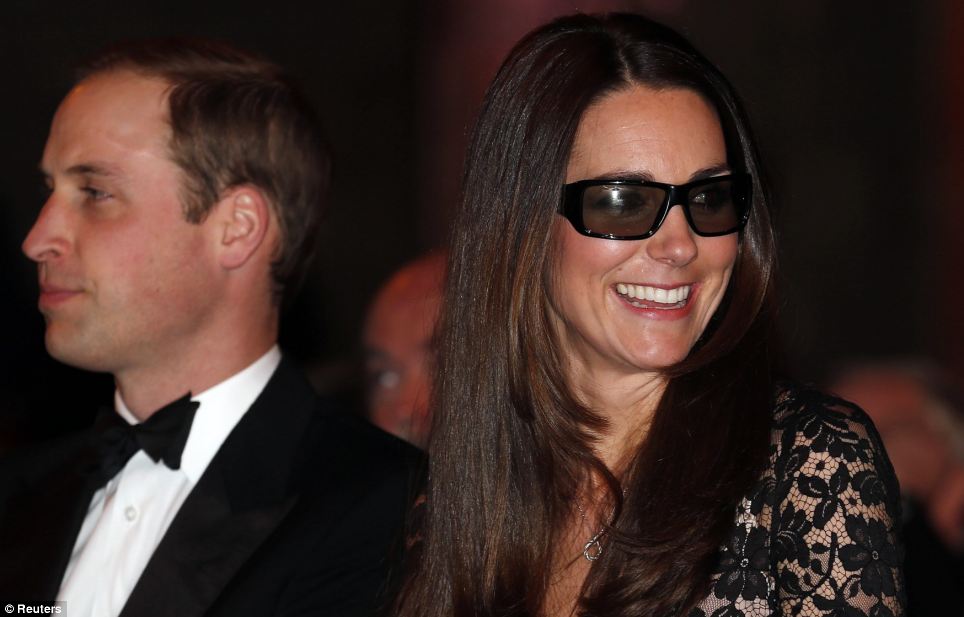 Kate looked delighted to be accessorising her stunning lace Temperley gown with the 3D specs