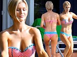 Everything's better in a bikini! Joanna Krupa displayed her sculpted physique in a flirty two-piece at her pool in Miami, Florida on Friday