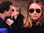 Mary-Kate Olsen kisses boyfriend at Knicks game