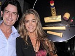 'I'm done being treated like a relative with a one-way ticket': Charlie Sheen chops up wedding gift after Denise Richards uninvites him to Christmas vacation