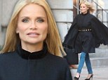 Working it: Kristin Chenoweth was spotted during a photo shoot on a New York City side walk, surrounded by onlookers as she worked a billowing black tunic-like garment 
