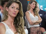 She still loves you! Gisele Bundchen patiently waits outside Tom Brady's locker room to console him after his football team loses game