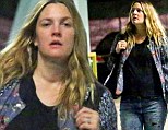 Not getting enough sleep? Pregnant Drew Barrymore looked tired as she showed off her burgeoning belly to run errands in Santa Monica, California on Tuesday
