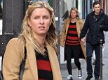 Well, they are in the city of love: Nicky Hilton and boyfriend James Rothschild walk hand in hand around Paris