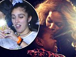 he whole family are fans! Madonna's daughter Lourdes parties with pal in VIP section at Beyonce concert while sister Mercy gets a kiss
