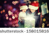 Christmas magic gift box and a woman happy family mother and Child baby - stock photo