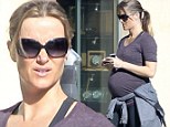 New baby for the new year! Caroline Lindqvist shows off her huge bump as she gets ready to have Owen Wilson's child
