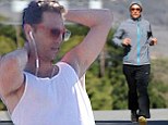 Slowly but surely... Matthew McConaughey continues his bid to bulk up once again after movie role weight loss