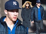 Holding hands: Nick Jonas and girlfriend Olivia Culpo held hands on Wednesday as they met up with friends in Mammoth Lake, California