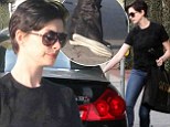 Nice outfit, pity about the shoes! Anne Hathaway ruins casual chic look with unsightly footwear on shopping trip in LA