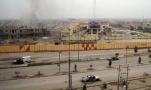 Police have fled the city of Fallujah as Al Qaeda-linked fighters take control in fight against Shia-led government