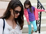 Making the most of the day: Katie Holmes took her daughter Suri to a movie on a gloomy day in Miami, Florida Saturday